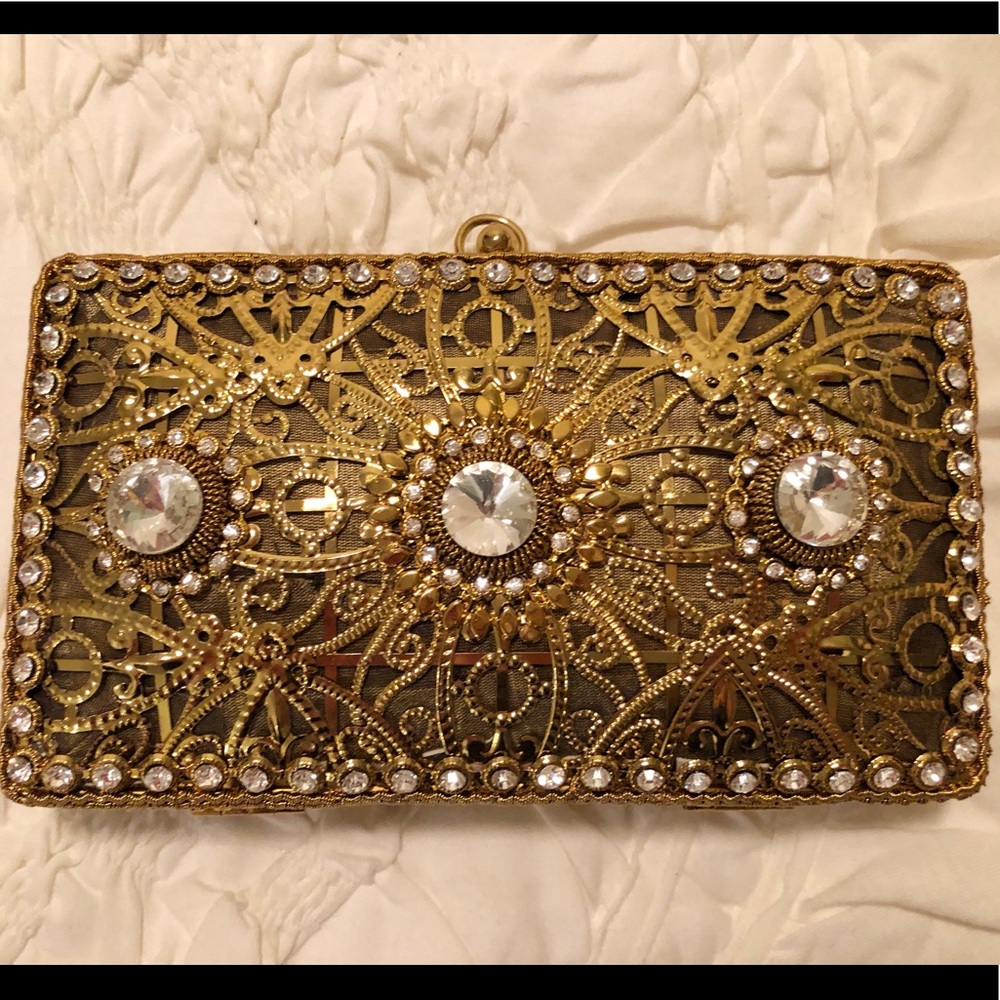 NWOT gold metal clutch